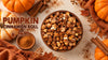 Pumpkin Cinnamon Roll Popcorn in a bowl with pumpkins